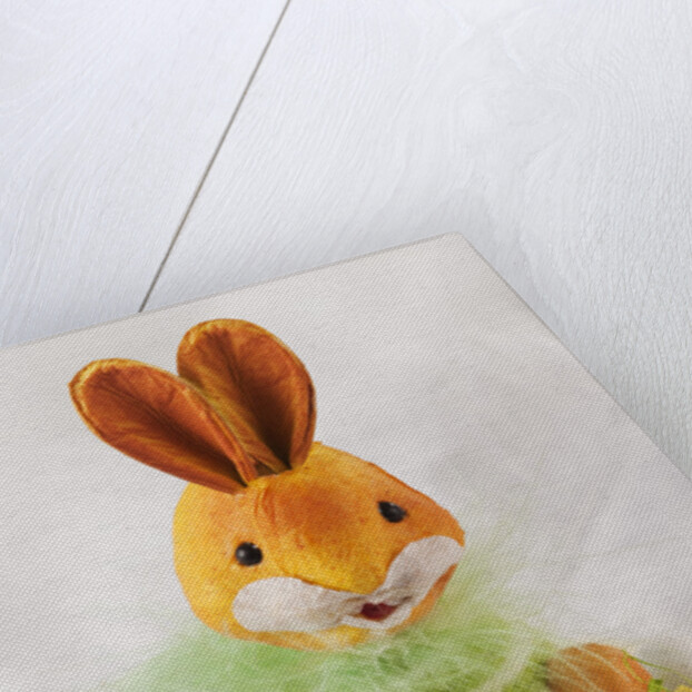 Toy bunny with candy eggs by Anonymous
