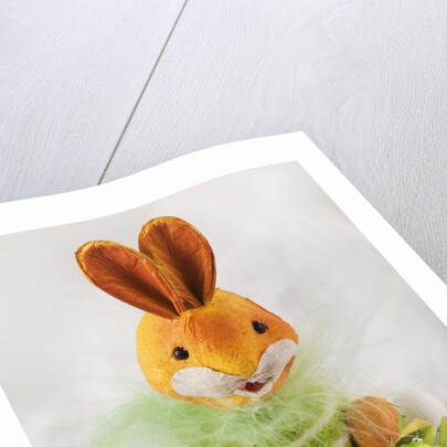 Toy bunny with candy eggs by Anonymous