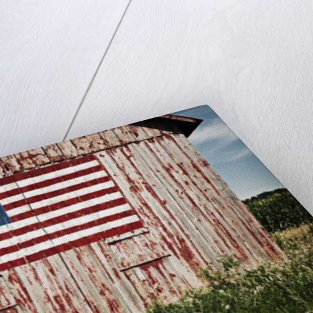 American flag painted on barn by Anonymous