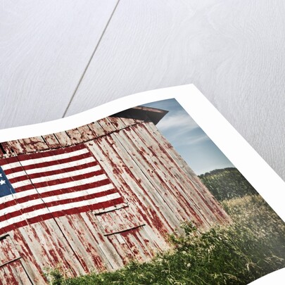 American flag painted on barn by Anonymous