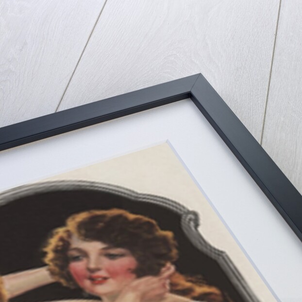 Brunette fixing hair in mirror by Anonymous