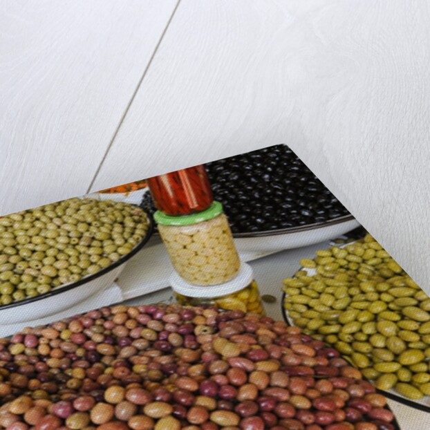Olive stand in a souk in the medina in Marrakech by Anonymous