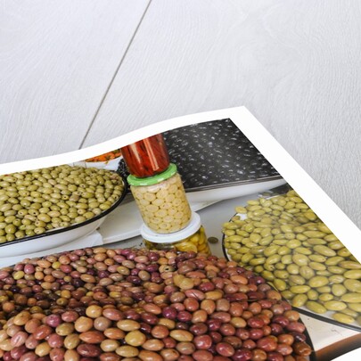 Olive stand in a souk in the medina in Marrakech by Anonymous