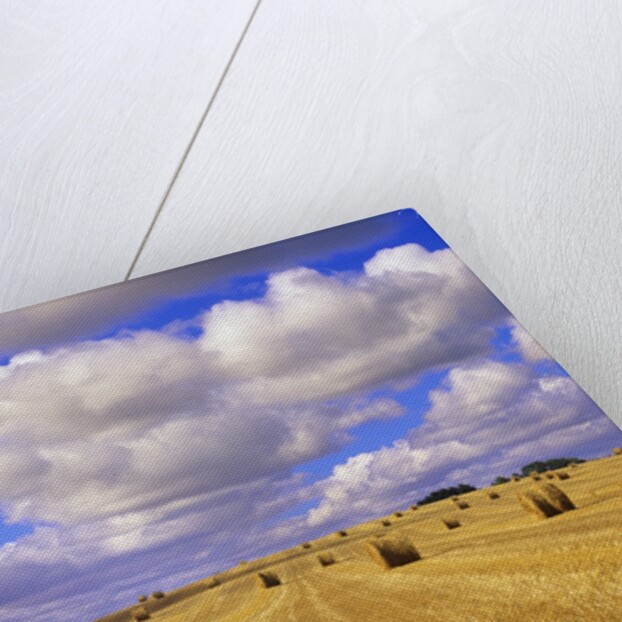 Bales and Clouds Near Sherbrooke, Saskatchewan, Canada. by Anonymous