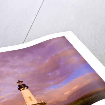 Yaquina Head lighthouse at sunrise by Anonymous