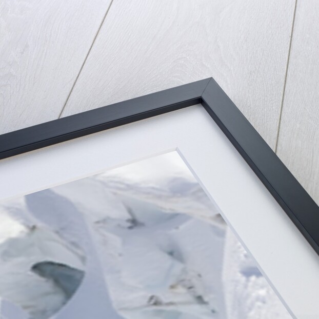 Backcountry skier in mid-jump by Anonymous