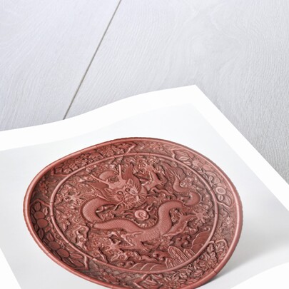 Dragon on a carved platter by Anonymous
