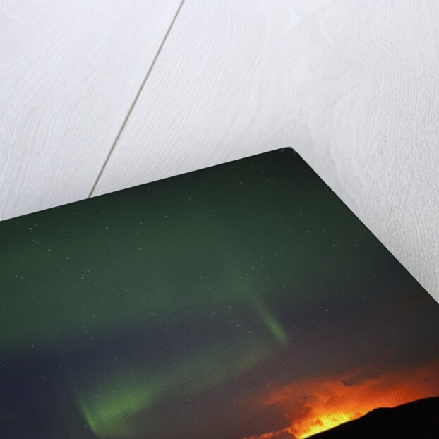 Aurora Borealis over eruption at Eyjafjallajokull glacier by Anonymous