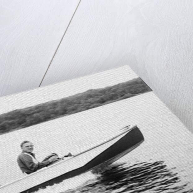 Two brothers speed by in a motor boat on a Wisconsin lake, ca. 1956 by Anonymous