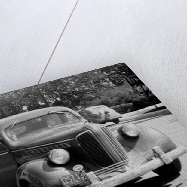 Eighteen year old boy with his first car, ca. 1944 by Anonymous