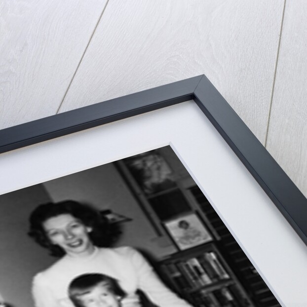 Family group in their living room, ca. 1958 by Anonymous