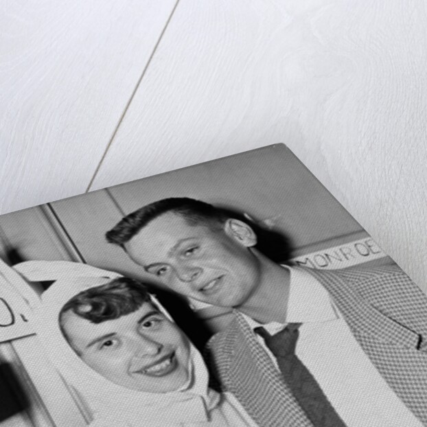 A couple on a date at a costume party pose, ca. 1955 by Anonymous