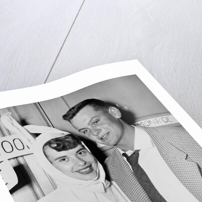 A couple on a date at a costume party pose, ca. 1955 by Anonymous