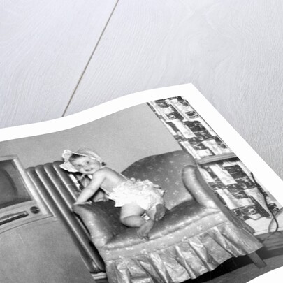 Baby girl wants to watch television, ca. 1954 by Anonymous