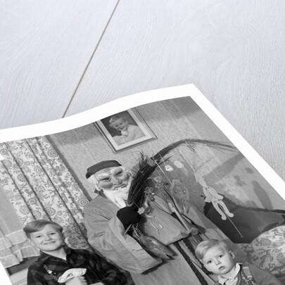 St. Nick visits with two German brothers, ca. 1948 by Anonymous