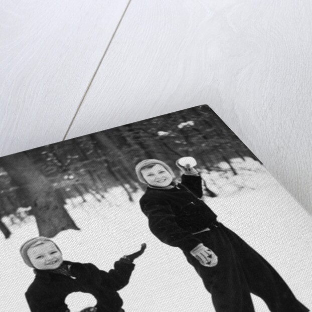 Two brothers play in the snow, ca. 1950 by Anonymous