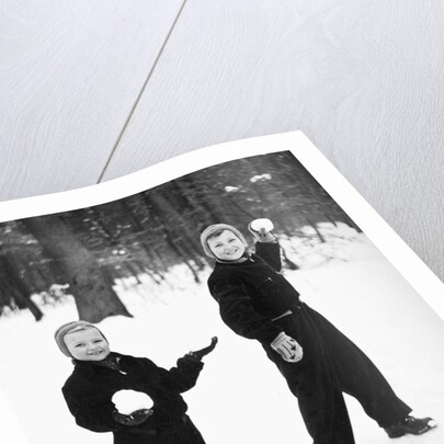 Two brothers play in the snow, ca. 1950 by Anonymous