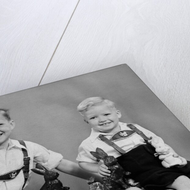 Two brothers sit with Easter decorations, ca. 1948 by Anonymous