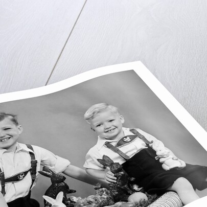 Two brothers sit with Easter decorations, ca. 1948 by Anonymous