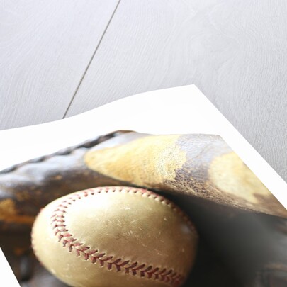 Baseball in glove by Anonymous