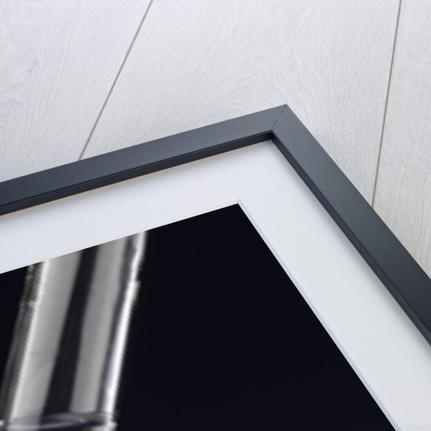 Test tube with liquid, over flame by Anonymous