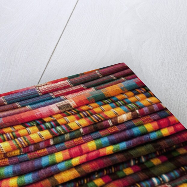 Textiles for sale in market in San Miguel de Allende by Anonymous