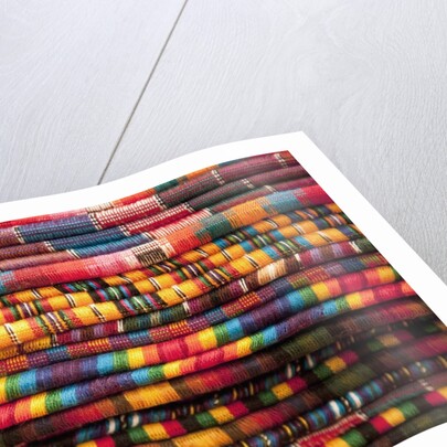 Textiles for sale in market in San Miguel de Allende by Anonymous
