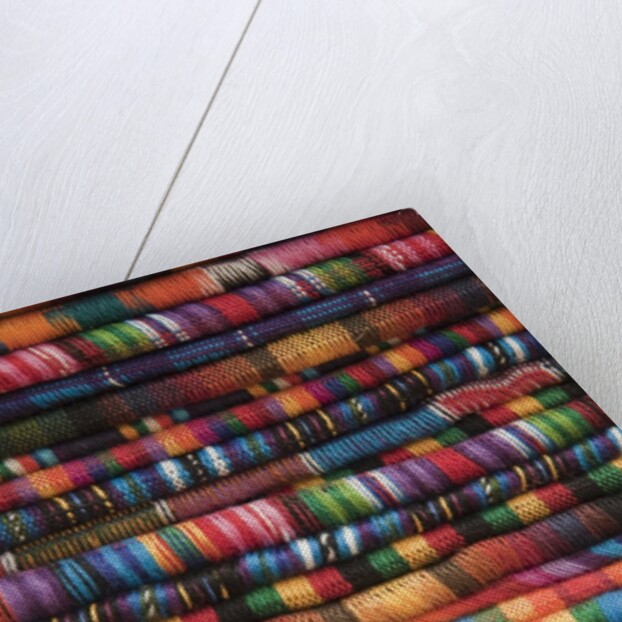 Textiles for sale in market in San Miguel de Allende by Anonymous