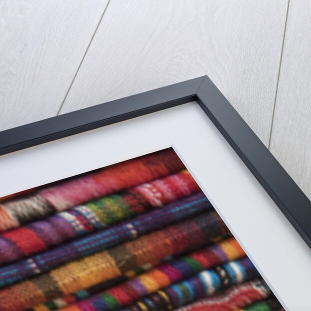 Textiles for sale in market in San Miguel de Allende by Anonymous
