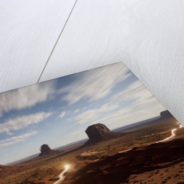 Night view of Monument Valley under the light of a full moon by Anonymous