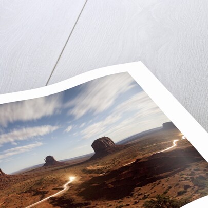 Night view of Monument Valley under the light of a full moon by Anonymous