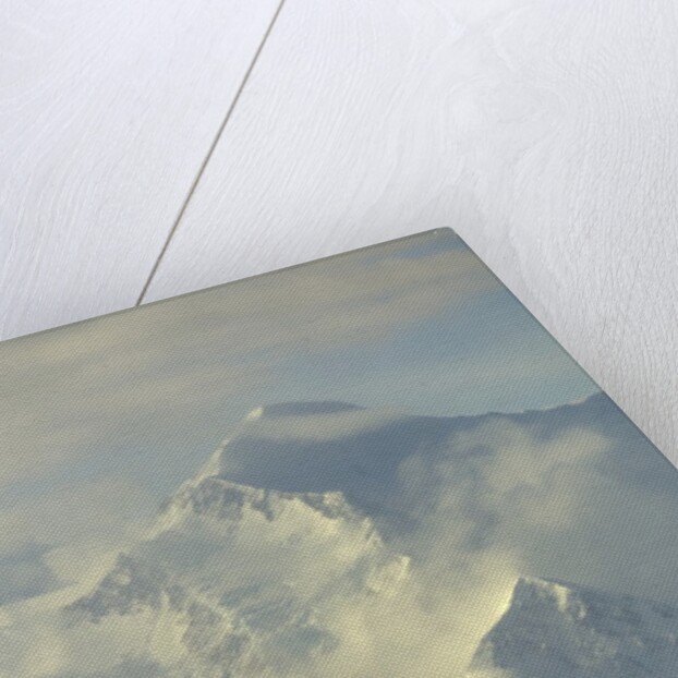 Cumulus clouds around Mt.McKinley by Anonymous