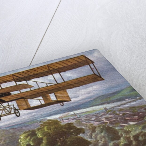 Biplane flying over French countryside by Anonymous