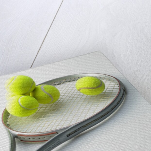 A tennis racket and balls by Anonymous