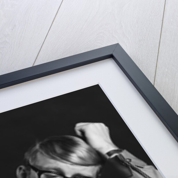 Young man studying reading books leaning on arm by Anonymous