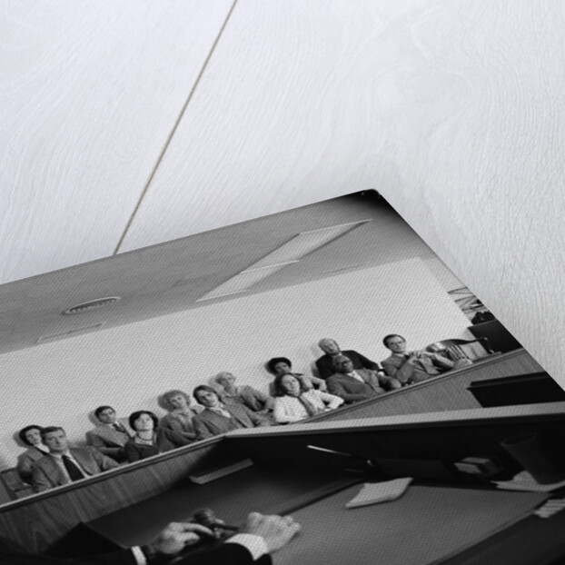 Judge addressing jury in courtroom by Anonymous