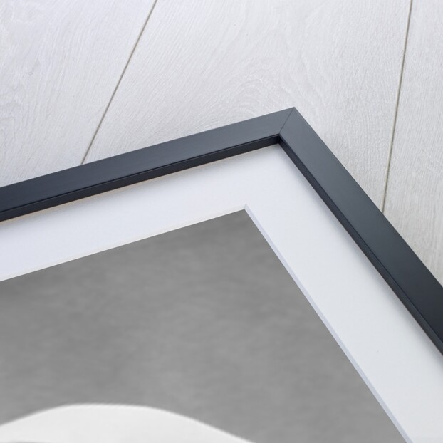 Smiling blond nurse with surprised expression talking on telephone holding up two fingers by Anonymous