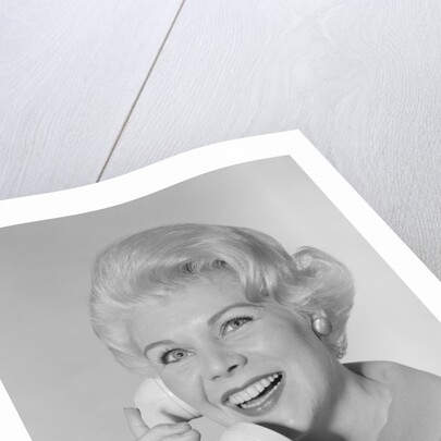 Portrait smiling stylish woman talking on telephone by Anonymous