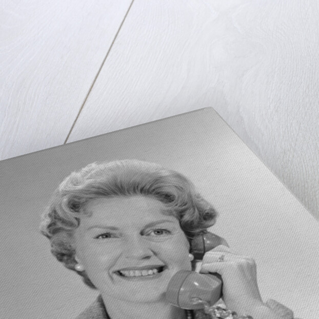Portrait smiling mature woman talking on telephone by Anonymous