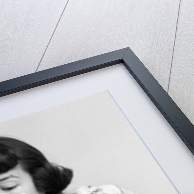 Woman face covered flour mixing ingredients reading brides cook book by Anonymous