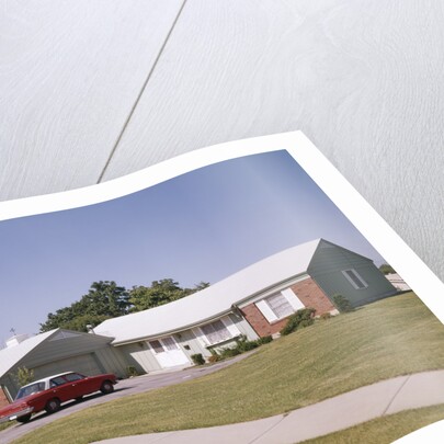 Suburban brick home with car driveway near dayton ohio by Anonymous