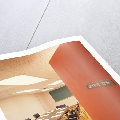 Conference room interior with table chairs chalkboard open door ajar by Anonymous