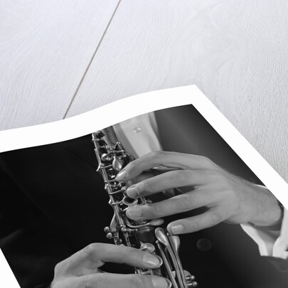 Male hands playing clarinet by Anonymous