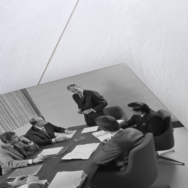 6 executive businessmen around conference table board meeting by Anonymous