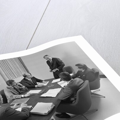6 executive businessmen around conference table board meeting by Anonymous
