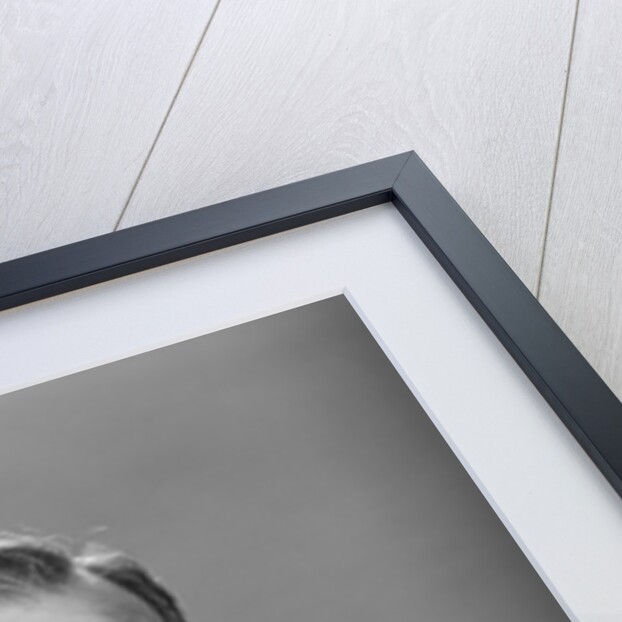 Man punching his fist into his palm with satisfied expression by Anonymous