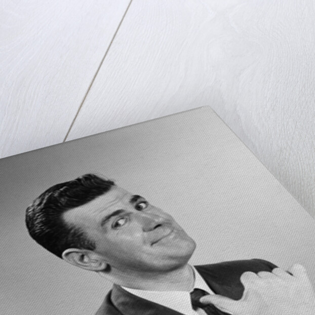 Business man smiling giving thumbs up sign pointing to himself by Anonymous