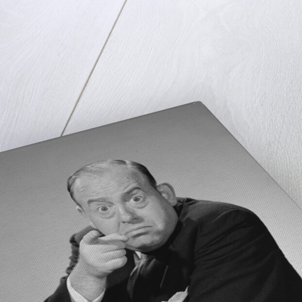 Angry businessman pointing finger bulging staring eyes wide open by Anonymous