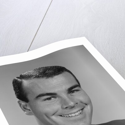 Smiling young man formal attire boutonniere in lapel bridegroom groom by Anonymous