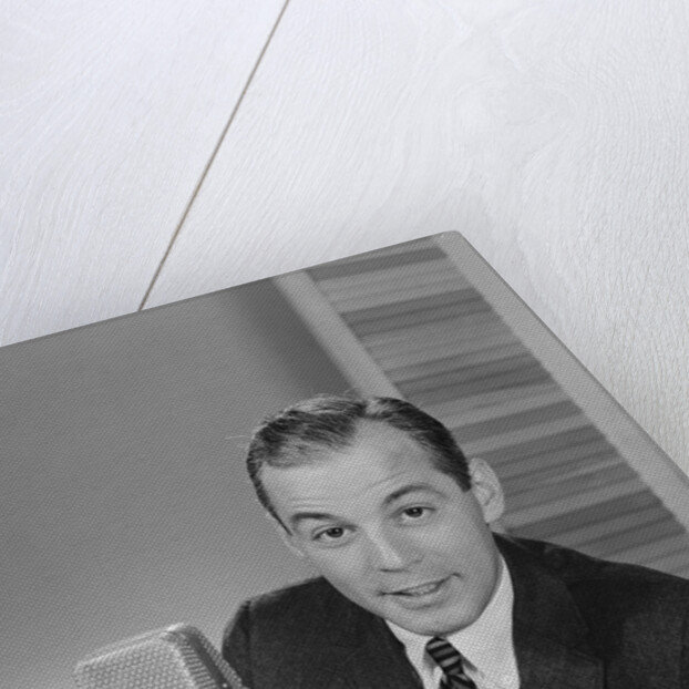 Man speaking into microphone radio tv announcer broadcaster by Anonymous